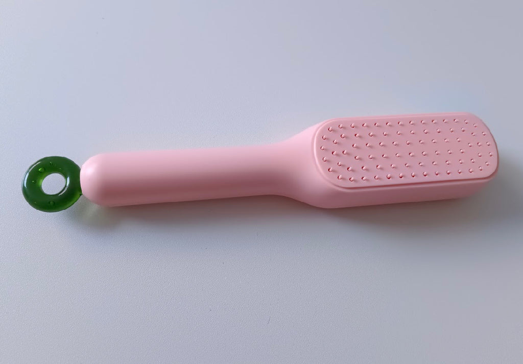 Cepillo Retráctil Autolimpiable